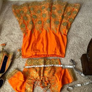 New, never ware. Party ware or ware in Mahendi size 38 or 40 woman.